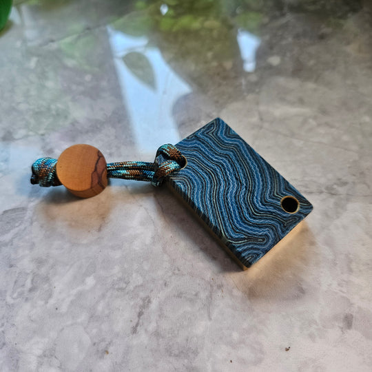 Brass x Micarta worry stone