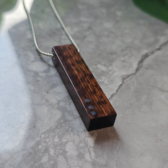 "Sequence" pendant