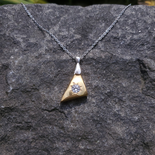 brass pillowed triangle pendant