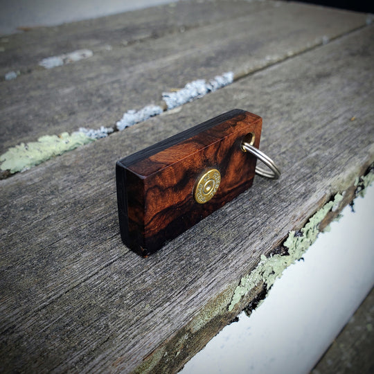 "shot in the dark" keychain/worry stone